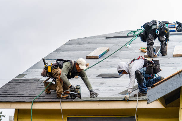 Professional Gutter Installation technician working in Matlock, IA